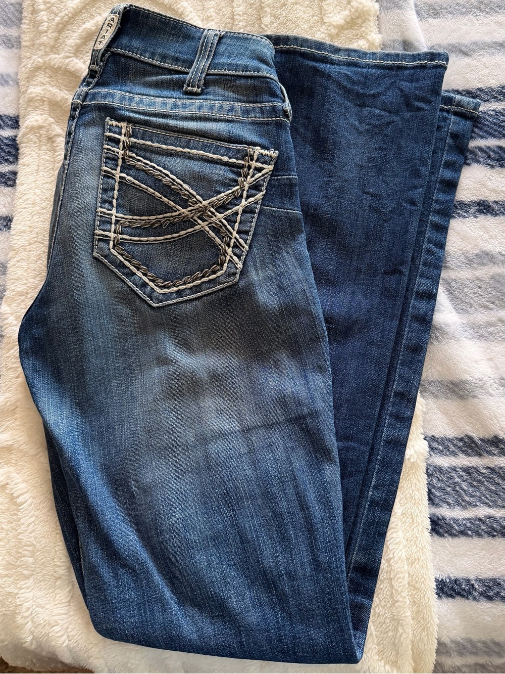 Women’s Ariat jeans.